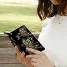 【ROMI HIME】【手帳型】蝶　トライバル　レインボー　ブラック